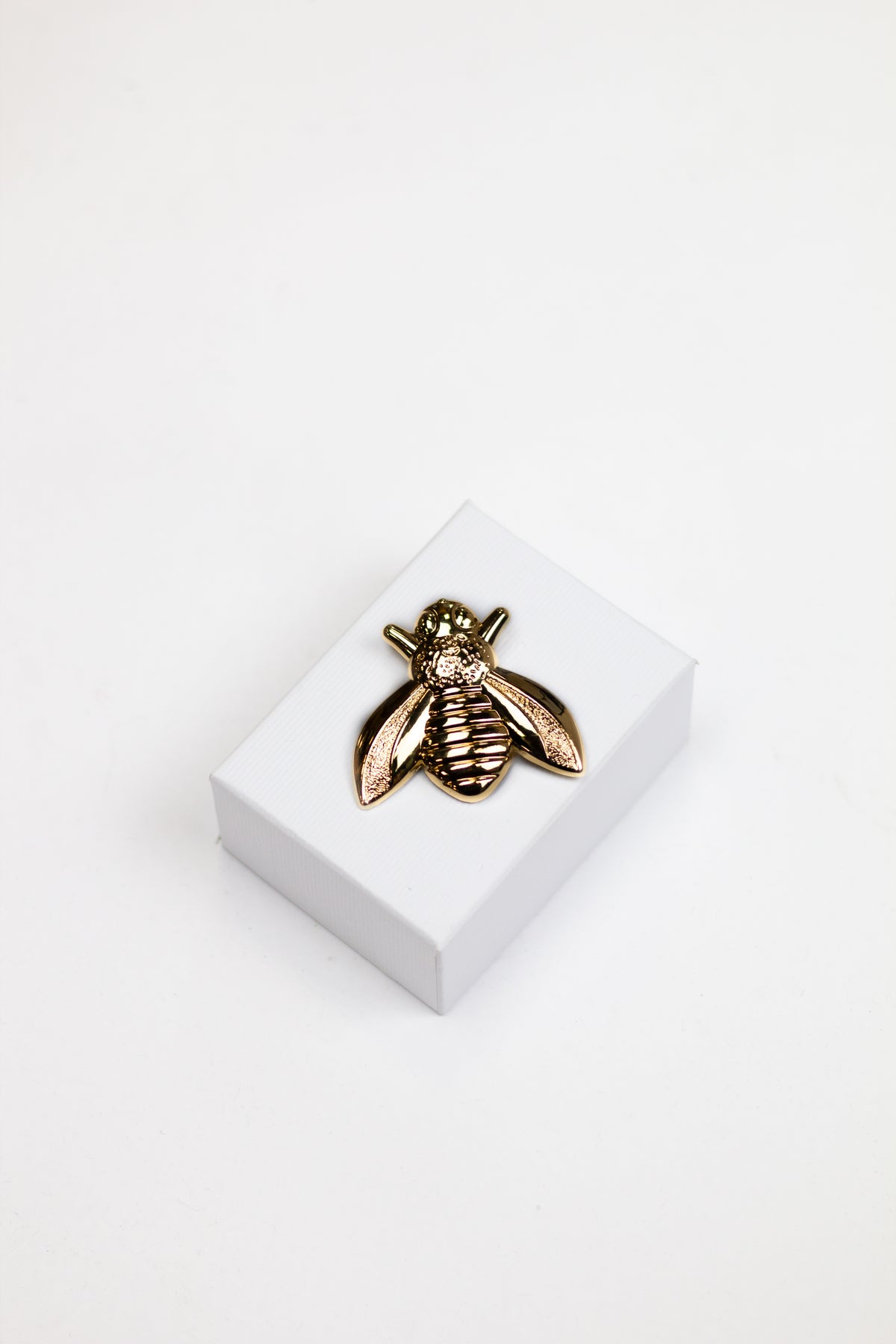 Broche Noi Goud